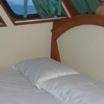 Cabin double bed on Somboon liveaboard at Similan island