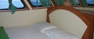Cabin double bed on Somboon liveaboard at Similan island